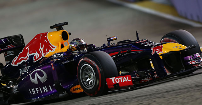 F1 Singapore Grand Prix: Vettel dominates as Alonso and Raikkonen fight into top three