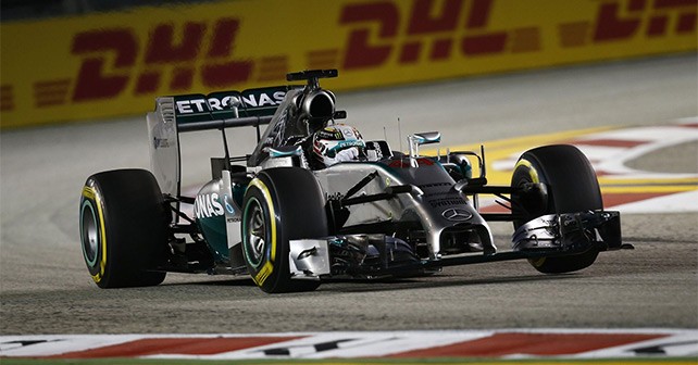 F1 Singapore Grand Prix: Hamilton takes championship lead with victory as luckless Rosberg retires