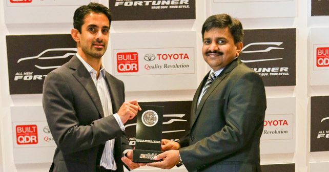 N. Raja, Director & Senior Vice President, Sales & Marketing, Toyota Kirloskar Motor, accepts the award for the Innova Crysta.