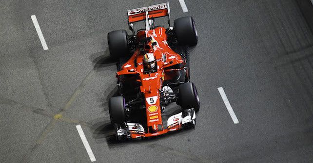 F1 2017: Vettel fights off raging Bulls to take Singapore Grand Prix pole