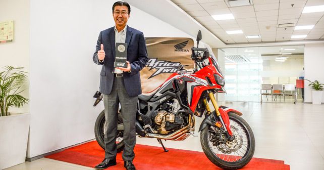 Minoru Kato, President and CEO, Honda Motorcycles and Scooters India, accepts the award for the Africa Twin