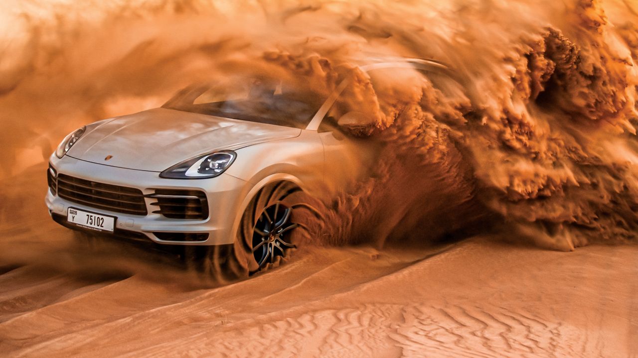 We go dune bashing in a Porsche Cayenne Coupe