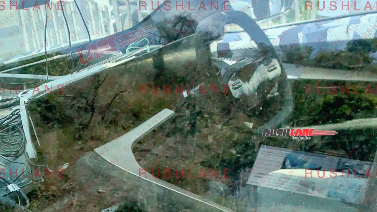 Mahindra BE.05 Electric SUV Interior Spotted Ahead of India Launch; Shows Twin-spoke Hexagonal Steering Wheel